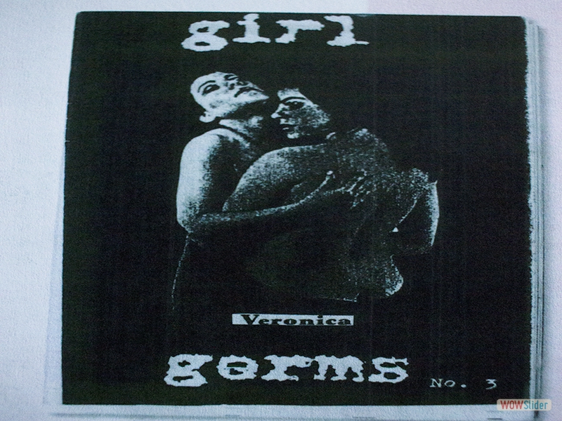 Girl Germs zine with two women embracing on the cover. 